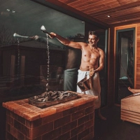 Finnish sauna with water sparkling stove